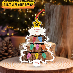 Personalized Christmas ornament shaped like a tree with family names and a star decoration