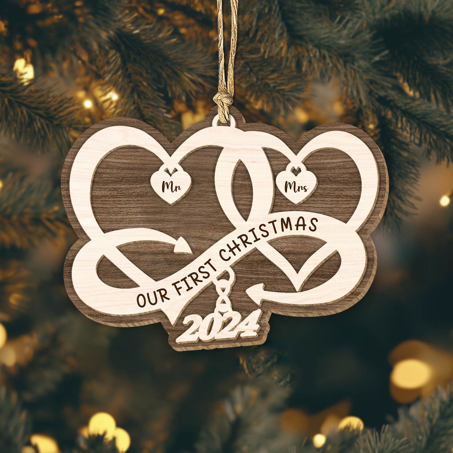 365Gifty personalized couple Christmas ornament with intertwined hearts and 2024 text hanging on tree