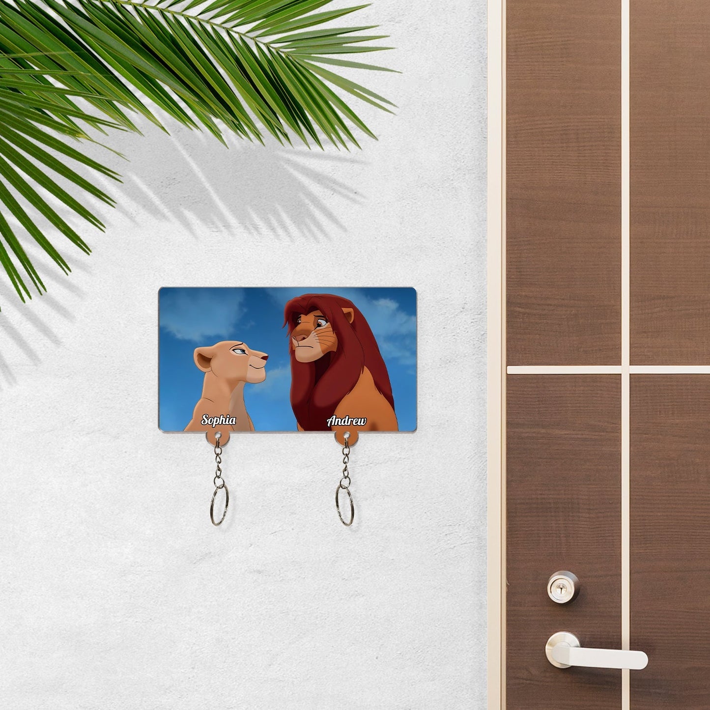 Personalized couple key holder with cartoon lion couple illustration and custom names Sophia and Andrew