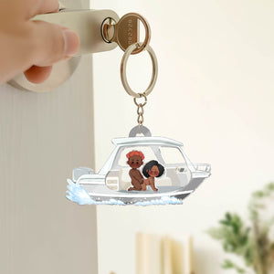 Personalized couple keychain featuring a couple on a boat for a unique gift