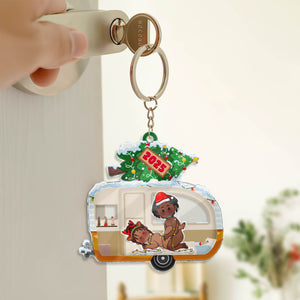 Personalized couple keychain featuring a holiday-themed design with a vintage camper and festive decorations