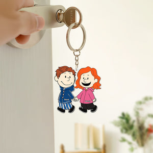 Personalized couple keychain featuring cartoon characters holding hands, ideal for gifts and memories