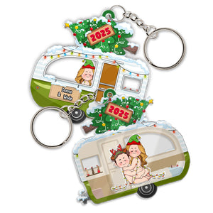 Personalized couple keychain featuring a festive camper design with customizable names and holiday decorations