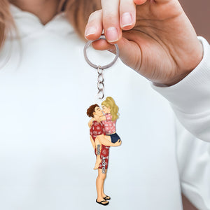 Personalized couple keychain featuring a cartoon couple in a romantic pose, perfect for gifts.