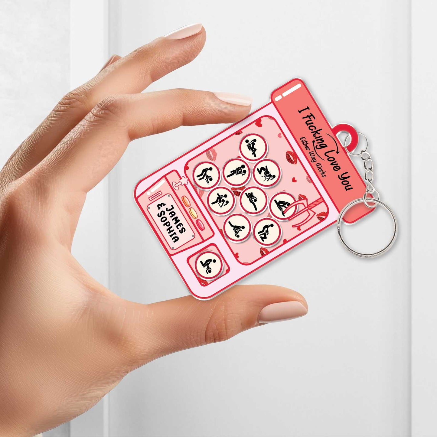 Personalized couple keychain featuring a playful pink design with love-themed elements