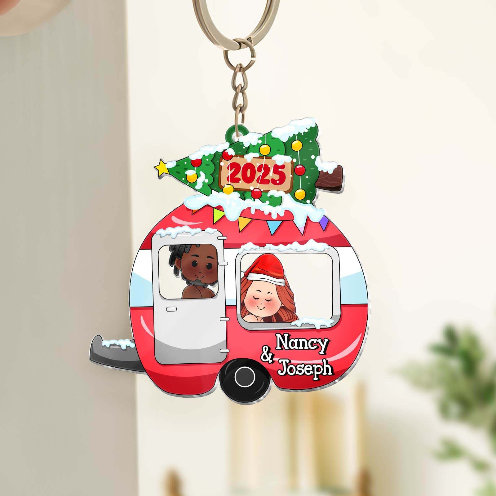 Personalized couple keychain featuring a camper with names Nancy and Joseph for special memories