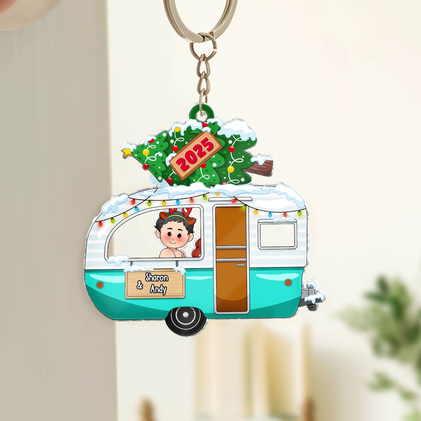 Personalized couple keychain featuring a festive camper with snow and a Christmas tree for Sharon and Andy