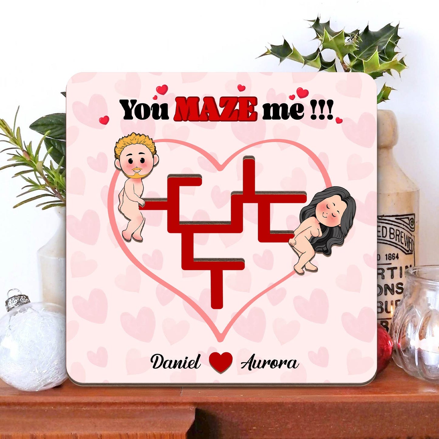 Personalized couple maze plaque with heart design and cartoon characters named Daniel and Aurora