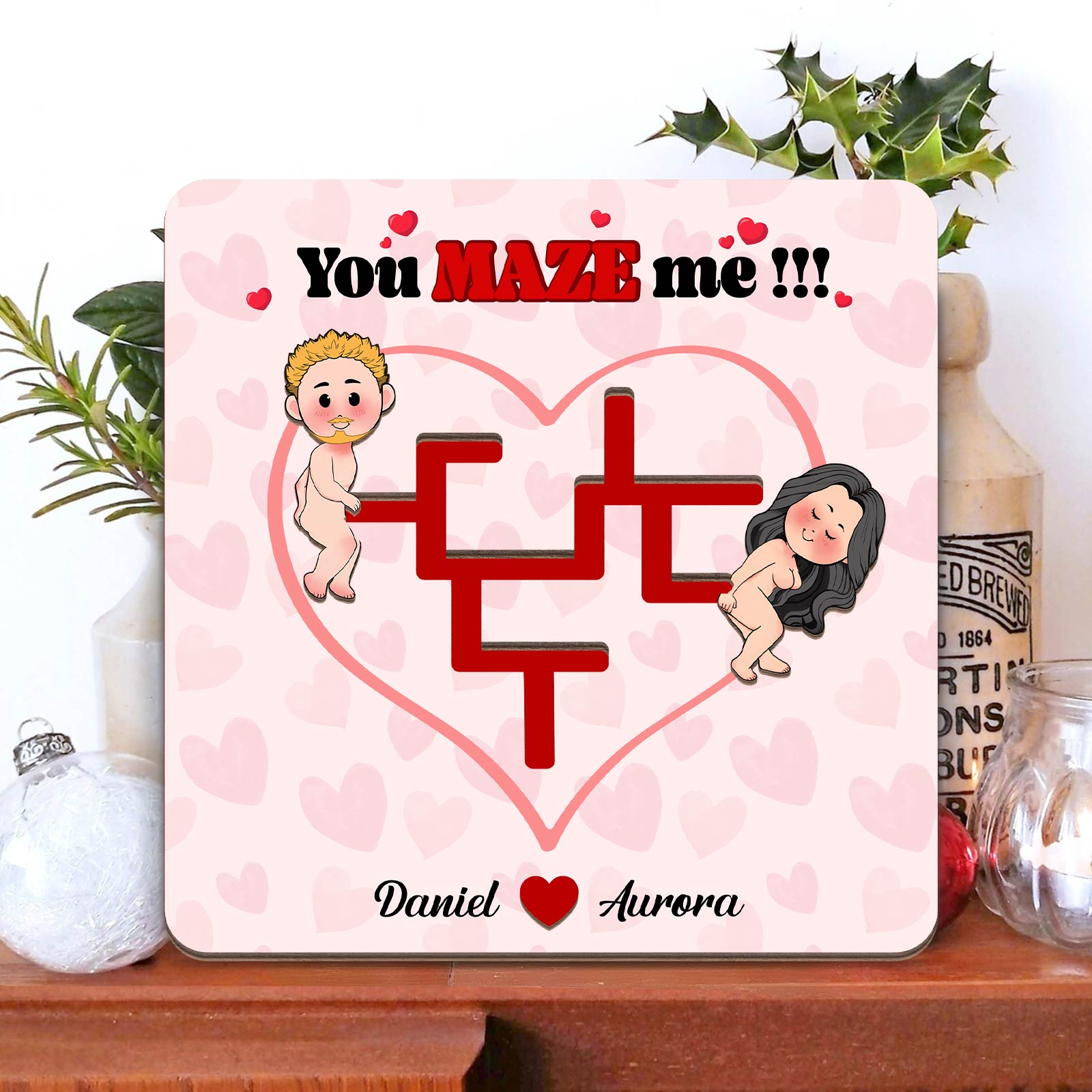 Personalized couple maze plaque with heart design and cartoon characters named Daniel and Aurora