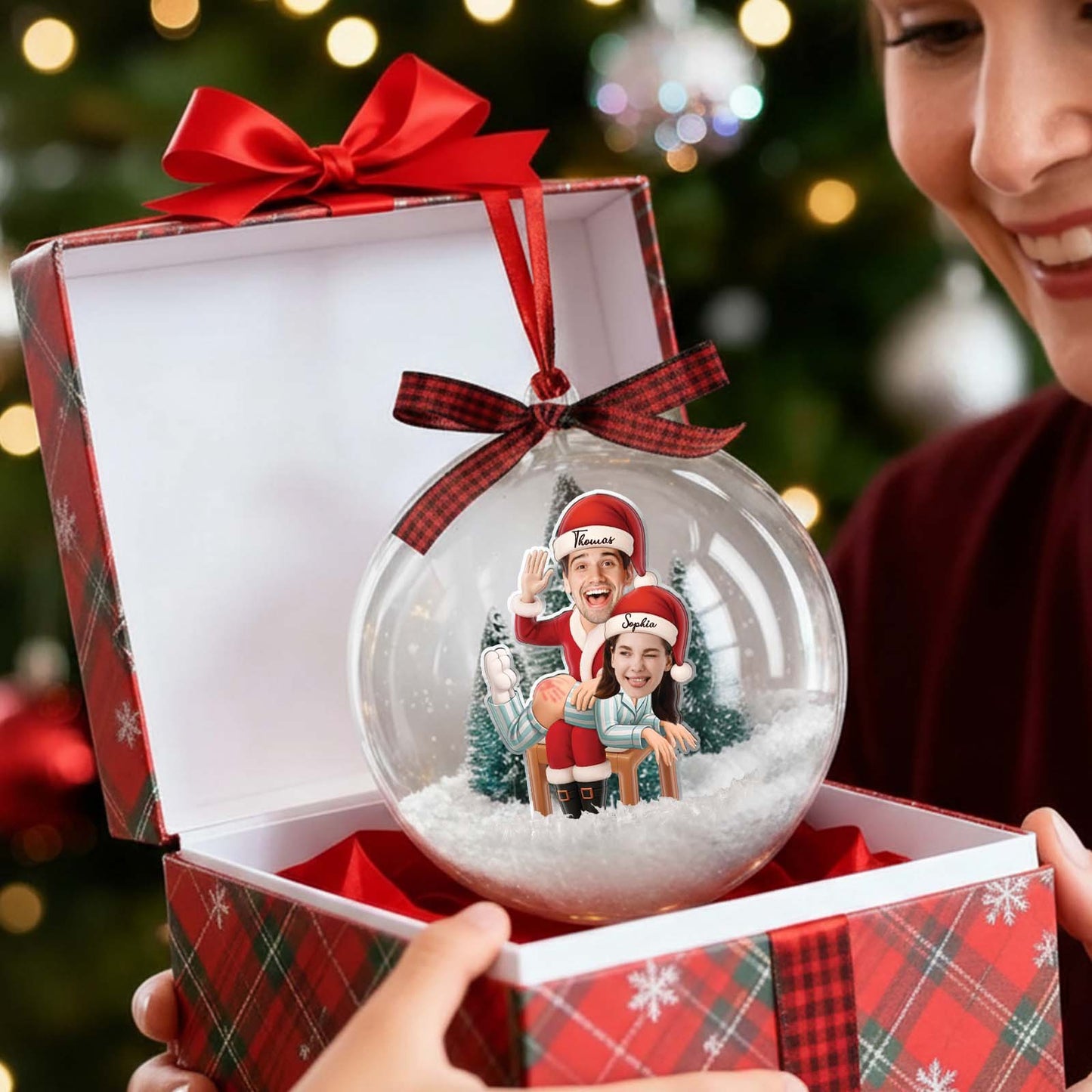 Personalized couple snow globe ornament featuring a happy couple inside festive snowy scene