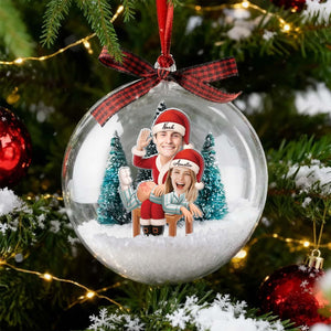 Personalized couple snow globe ornament featuring a festive couple in winter scenery