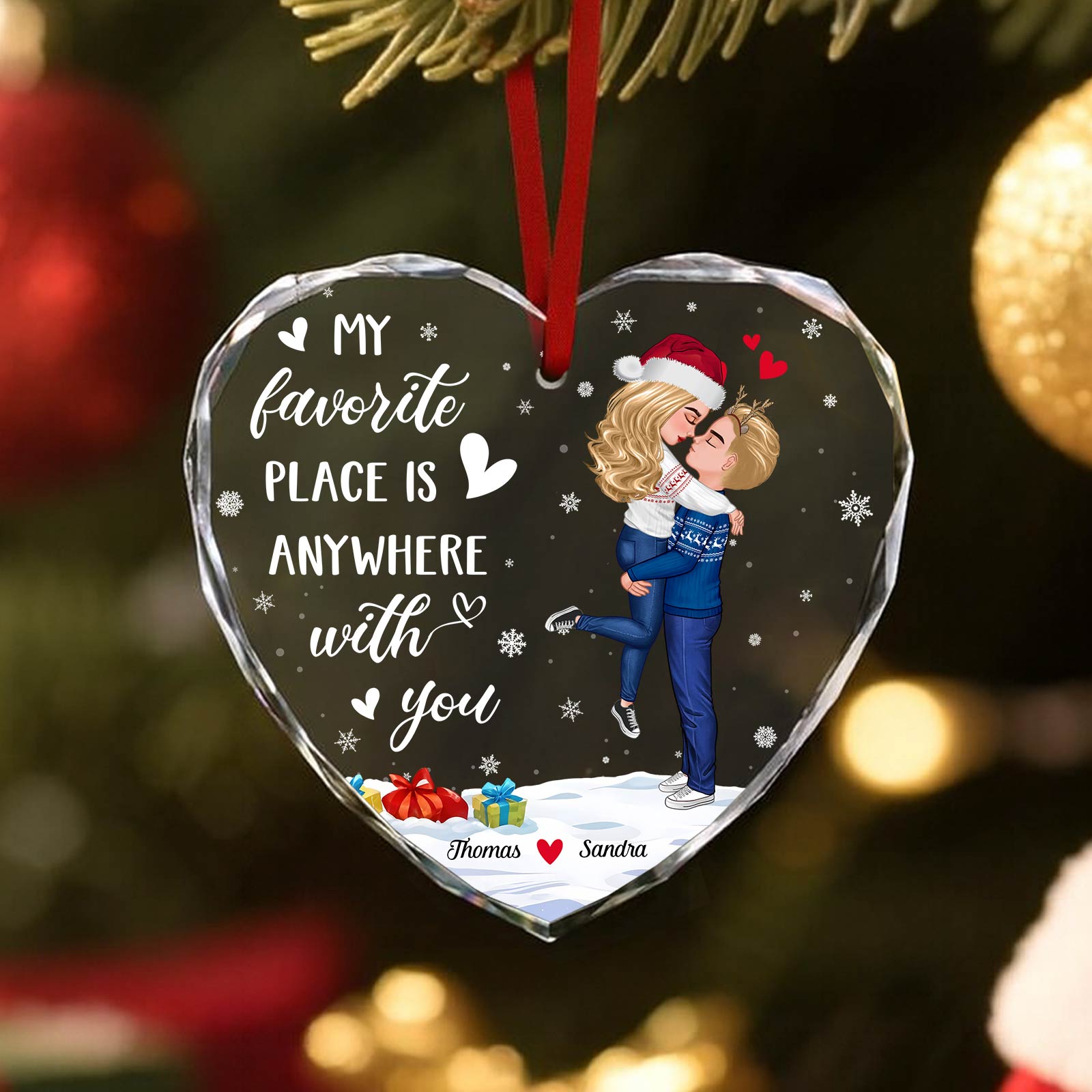 Personalized couples glass ornament featuring a heart design with a couple hugging and customizable names