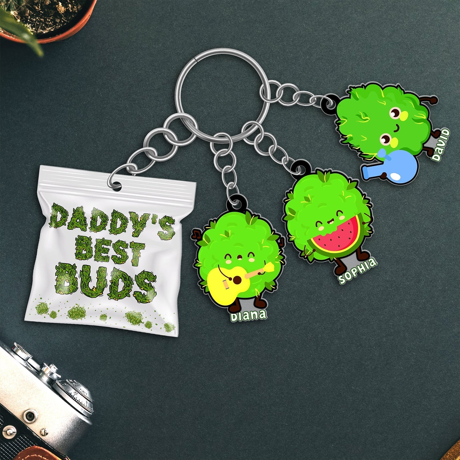 Personalized daddy keychain featuring cute character charms and custom names for a unique gift
