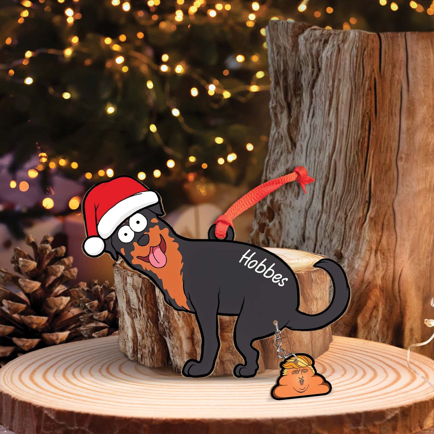 Personalized dog Christmas ornament featuring a black and brown dog with Santa hat and name Hobbes