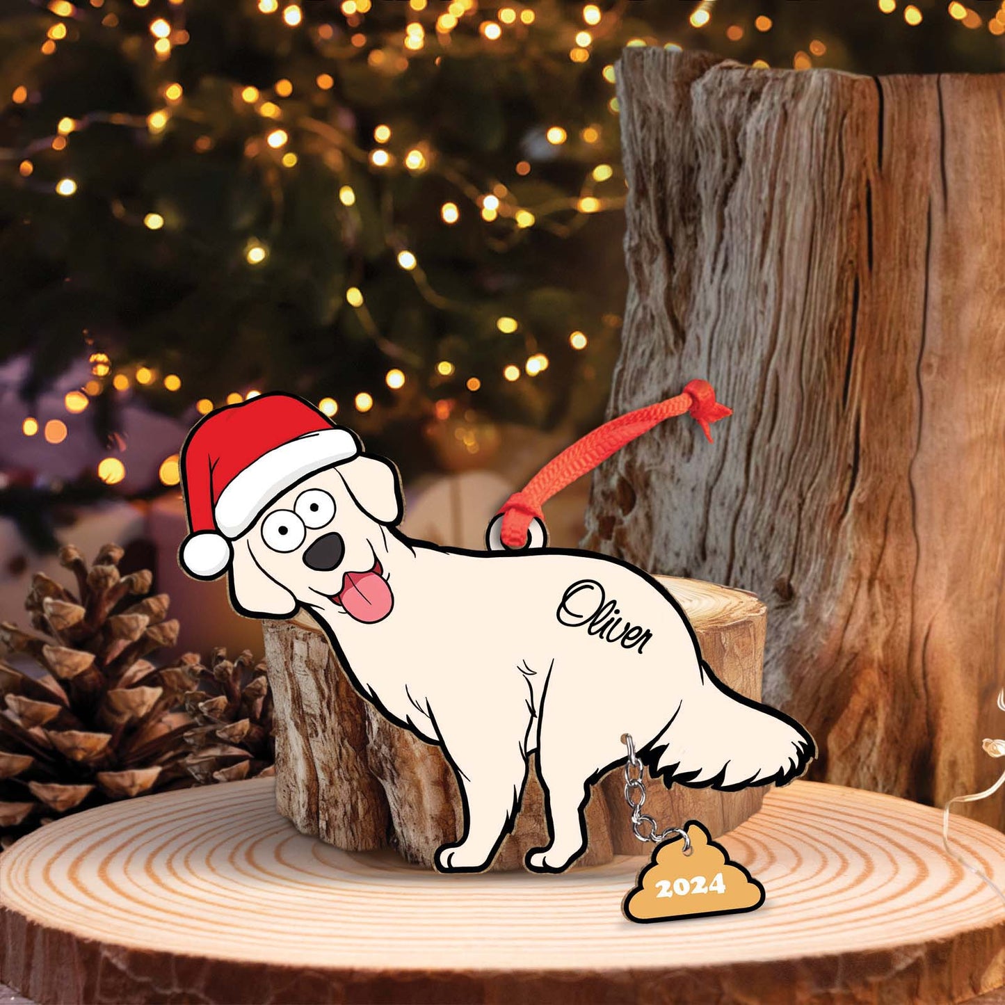Personalized dog Christmas ornament with Santa hat and name Oliver hanging on wooden log display