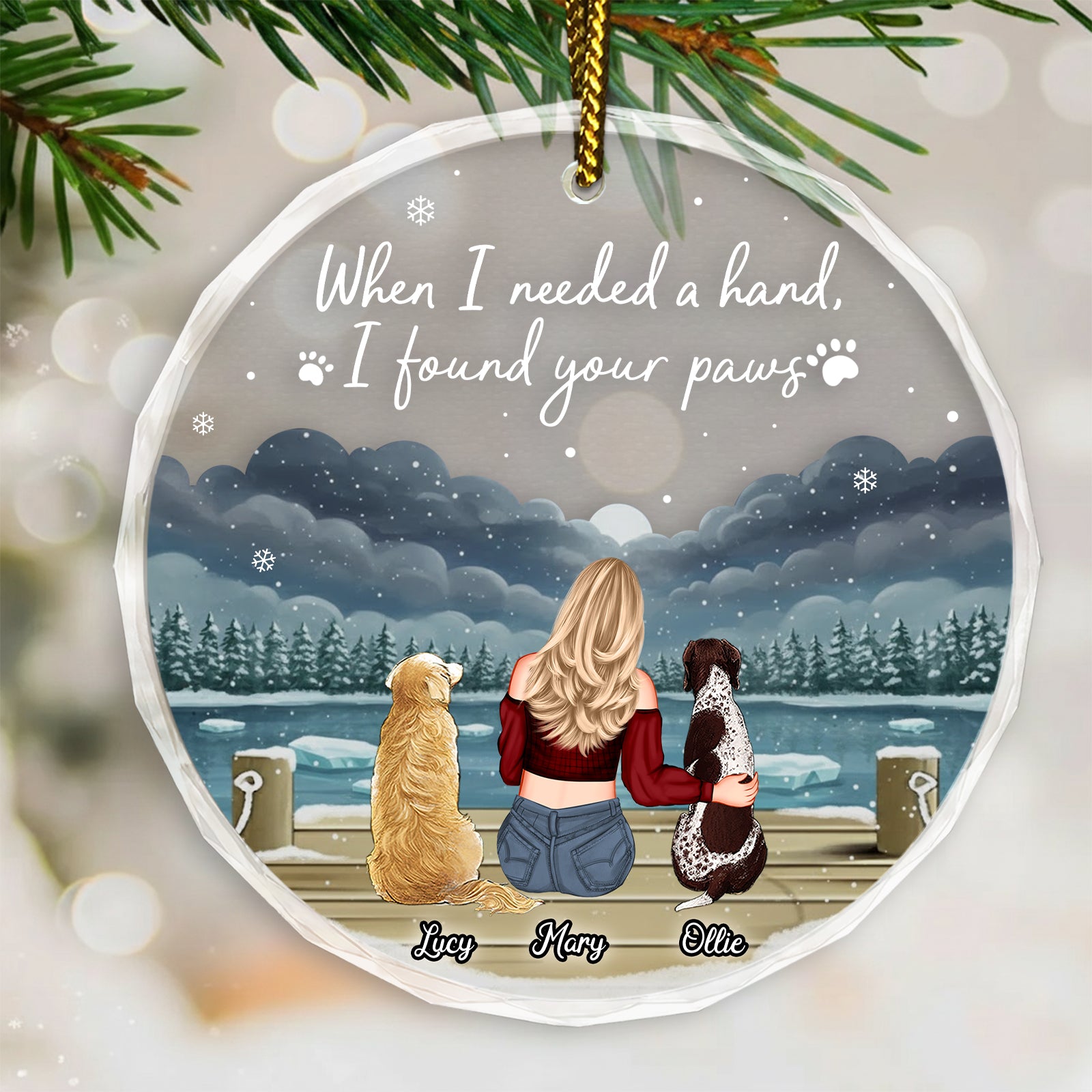 Personalized dog lover ornament featuring a woman with two dogs by a snowy lake