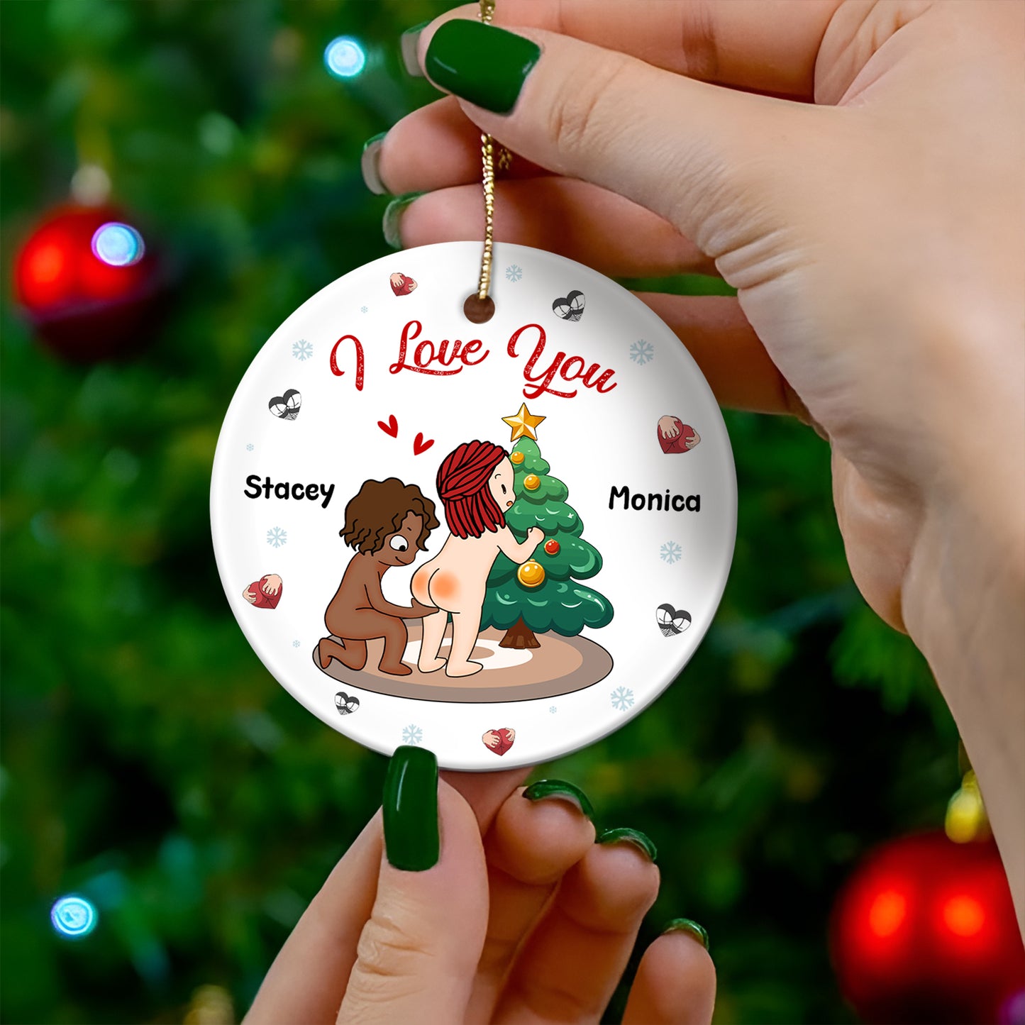 Personalized double-sided ceramic ornament featuring a couple by a Christmas tree with names Stacey and Monica