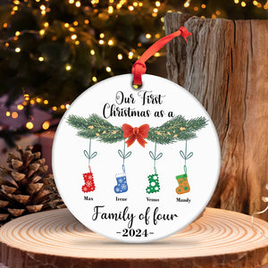 Personalized family Christmas ornament with names and stockings celebrating first Christmas as a family of four 2024