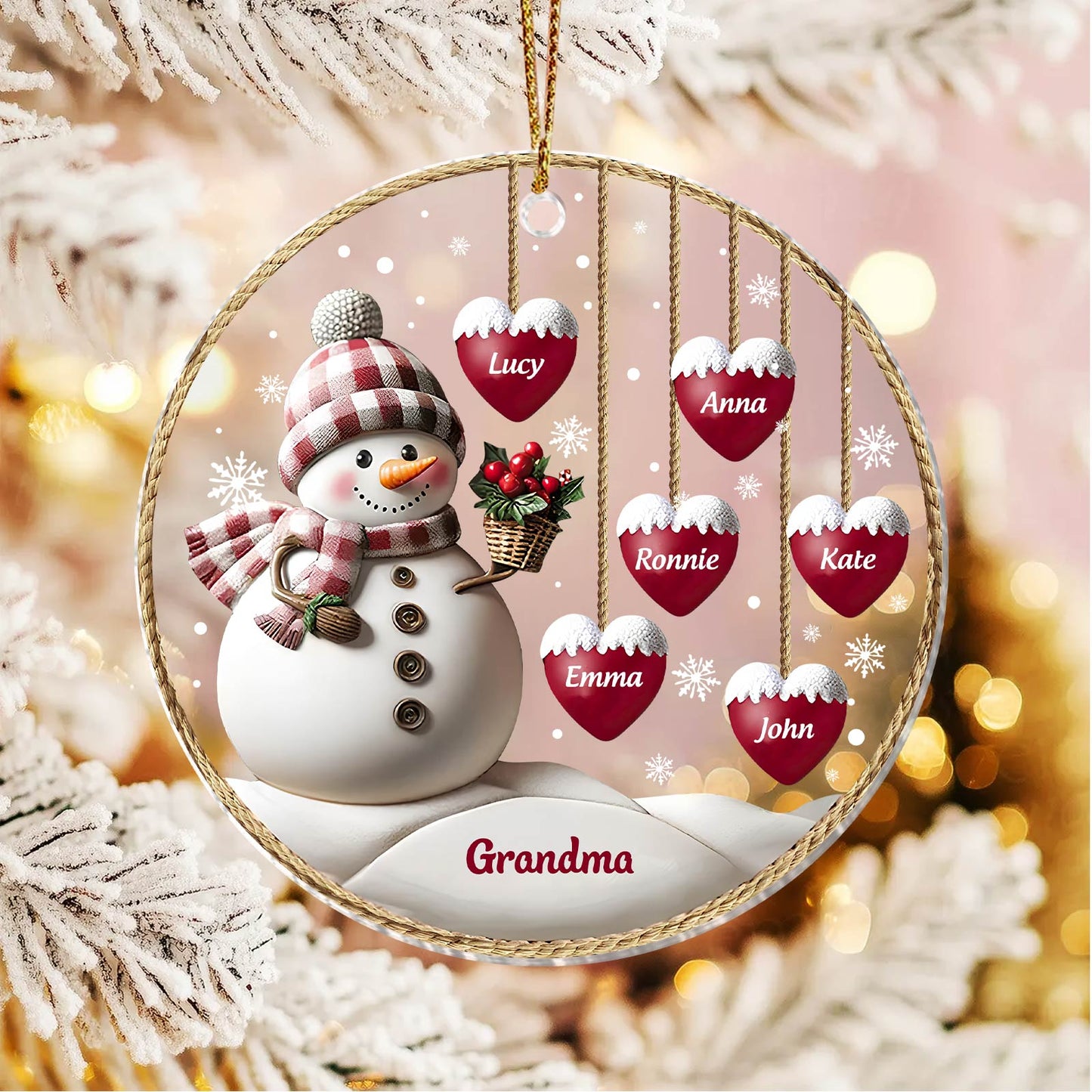 Personalized family Christmas ornament featuring a snowman and six heart-shaped name tags with white snow accents