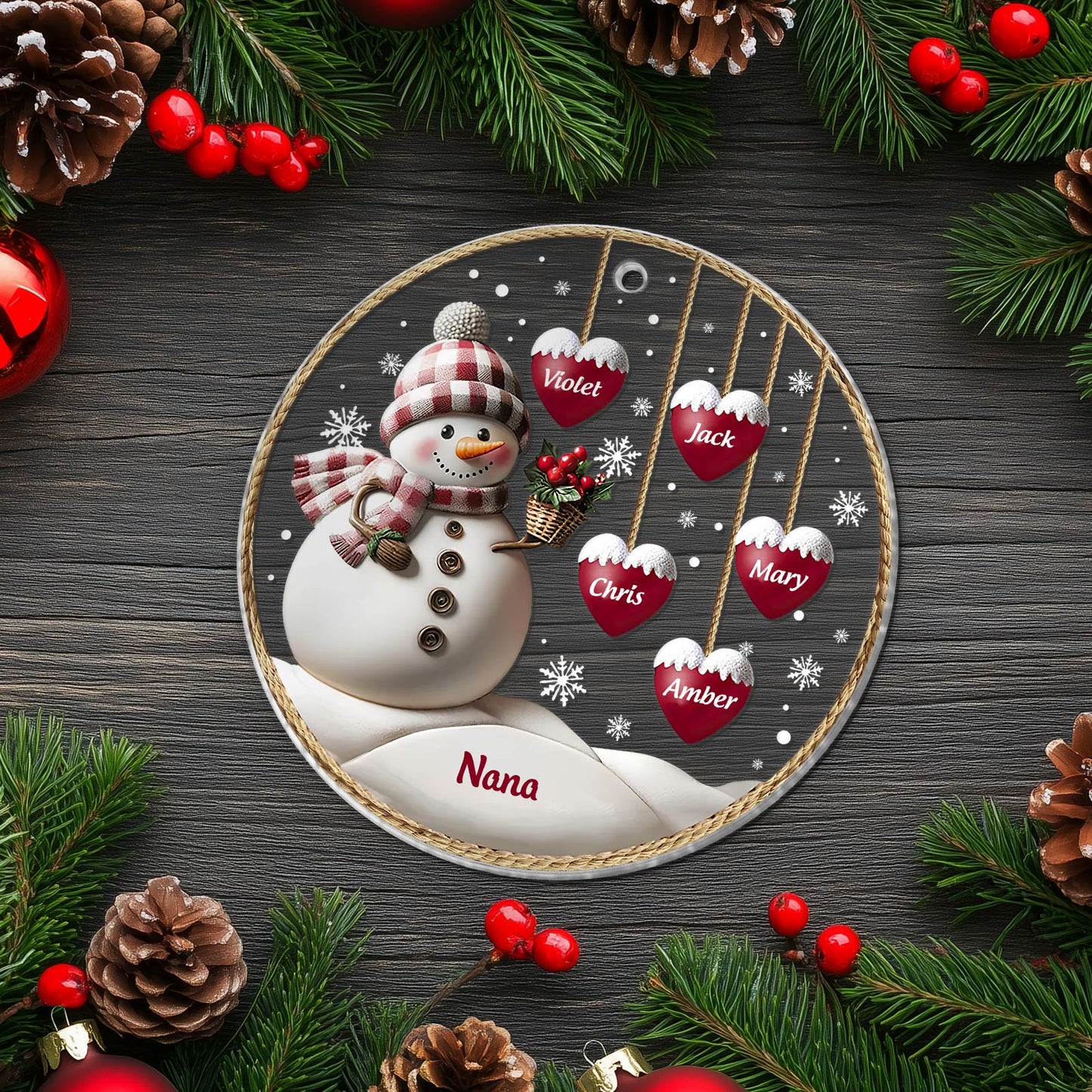 Personalized family Christmas ornament with snowman and heart-shaped name tags in festive holiday design