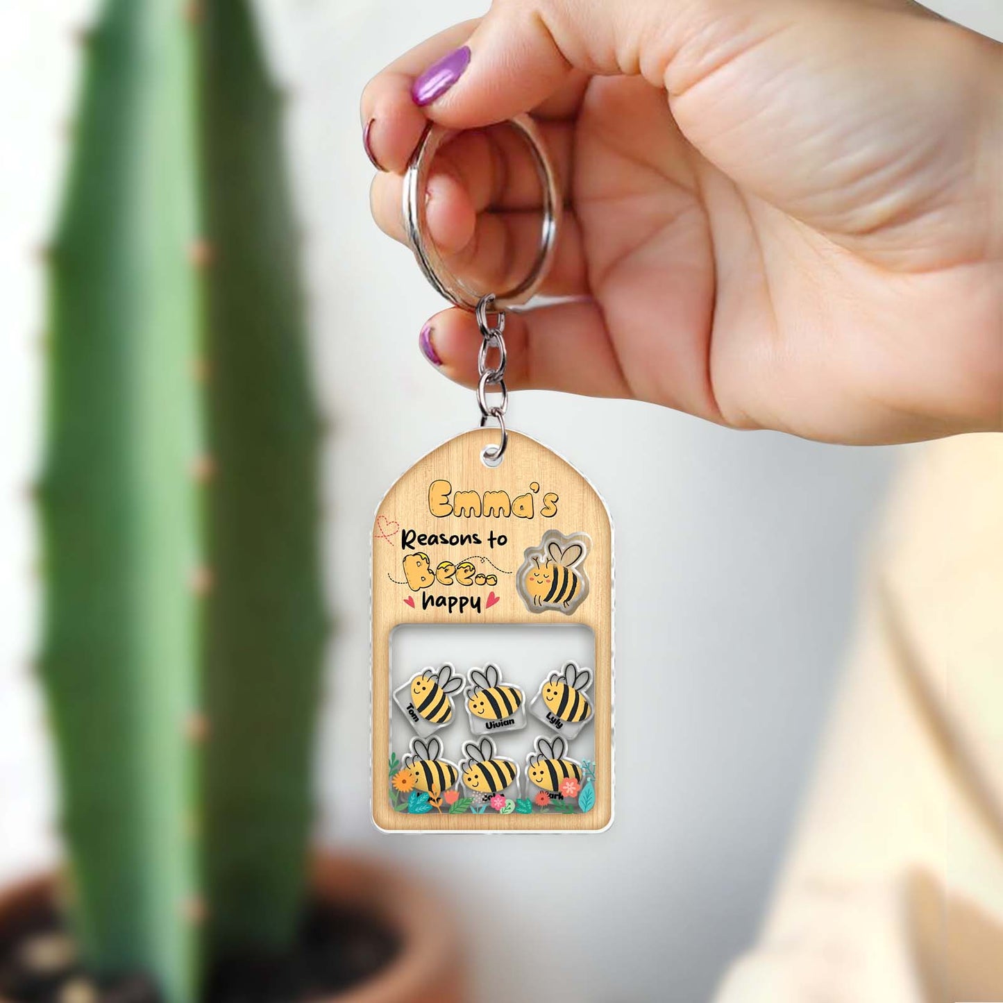 Personalized family keychain with colorful bees and custom name tag for unique gifting
