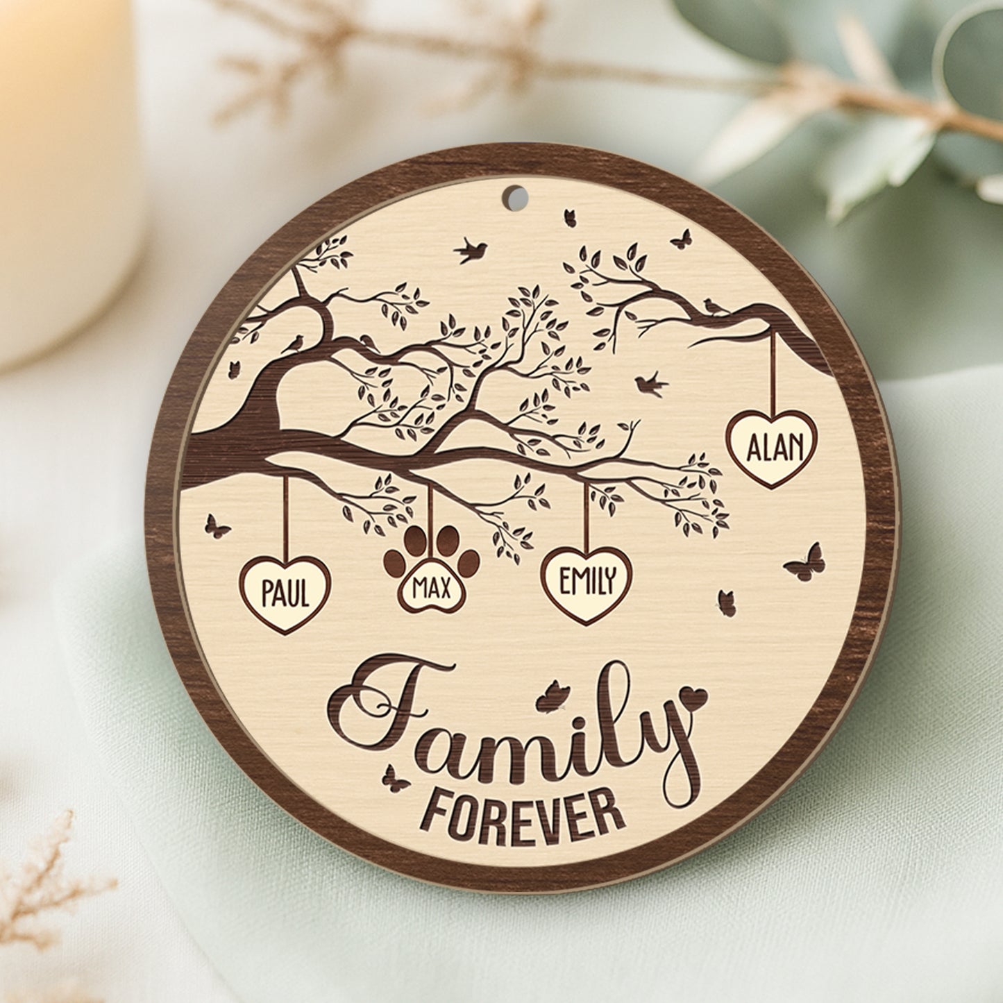 Personalized family wooden ornament featuring names and a tree design for cherished memories