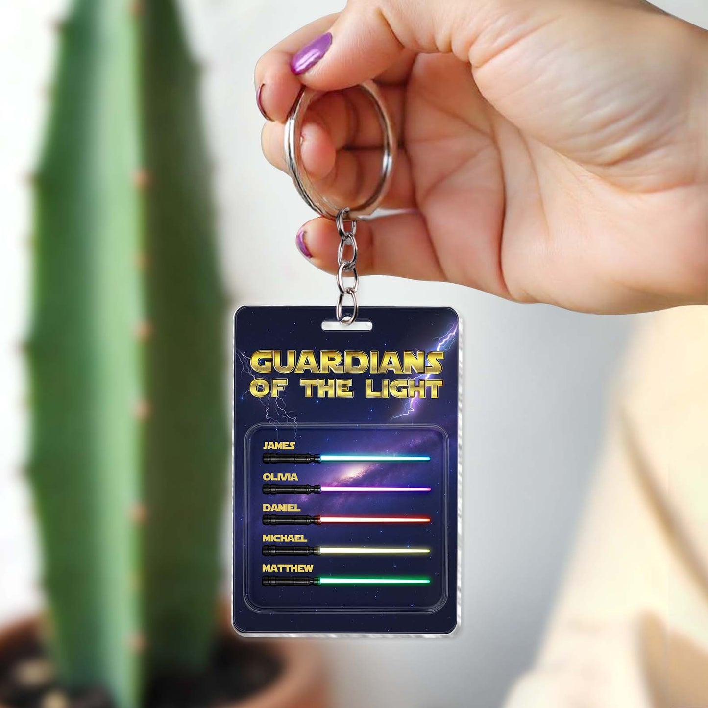 Personalized father keychain featuring names on a Guardians of the Light design