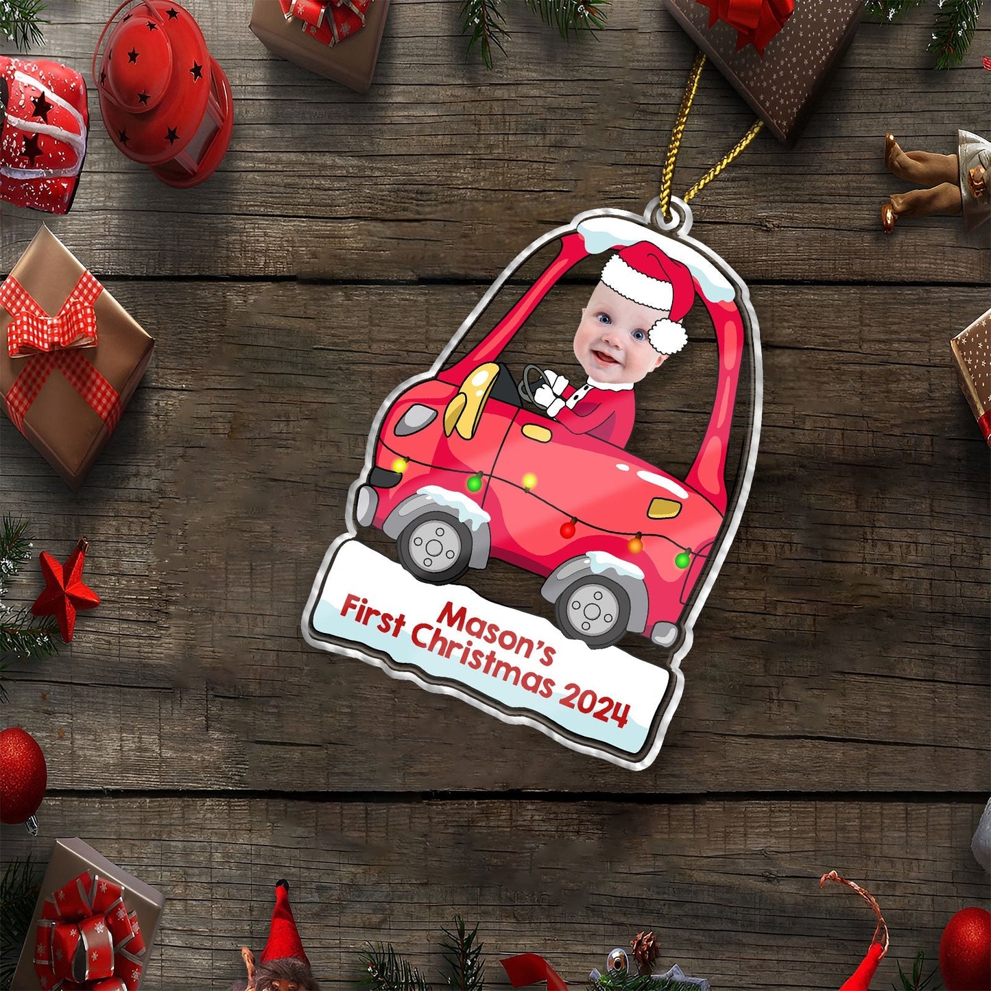 Personalized first Christmas ornament featuring a baby in a red car with Santa hat and custom text