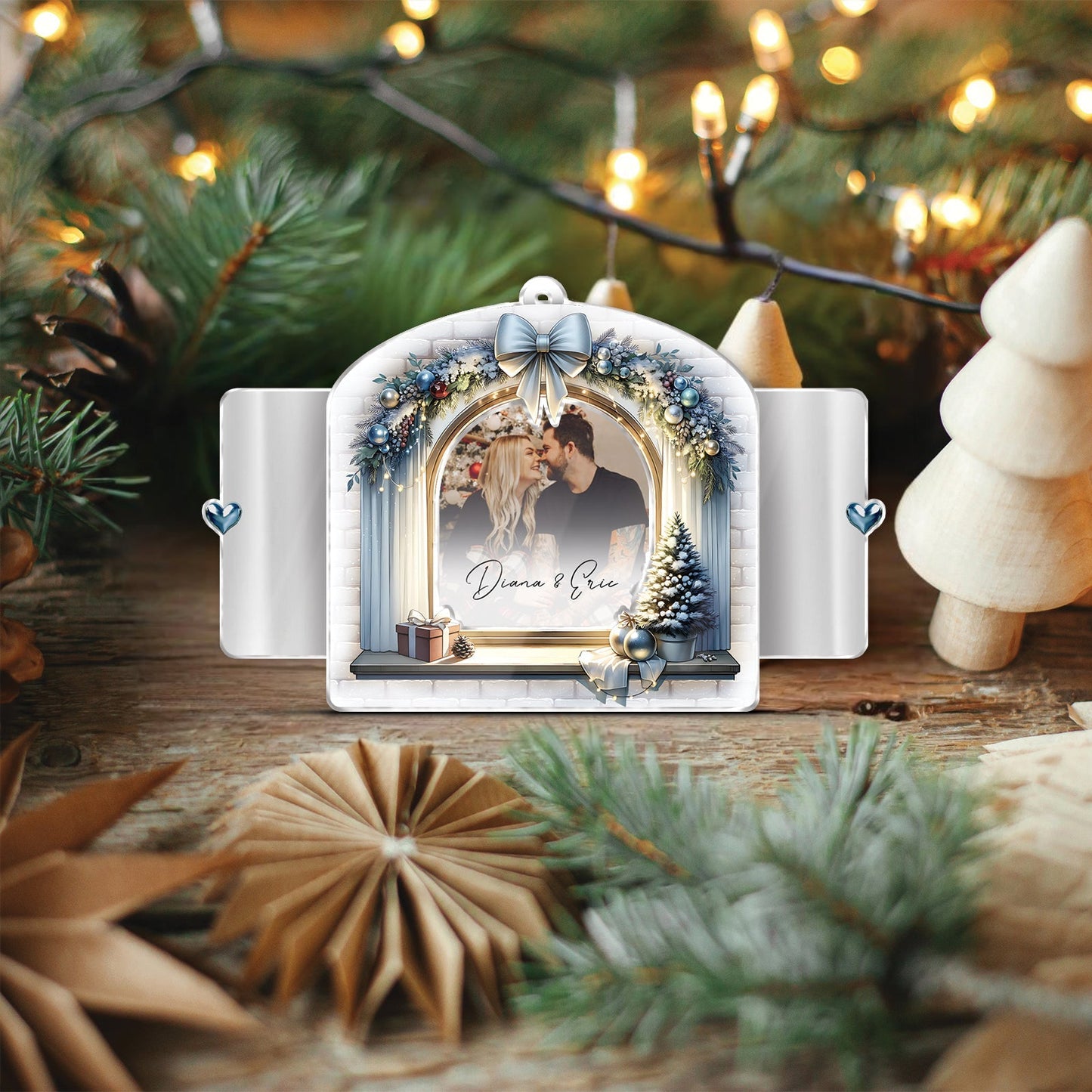 Personalized first Christmas ornament for couples featuring a photo frame with holiday decorations and names