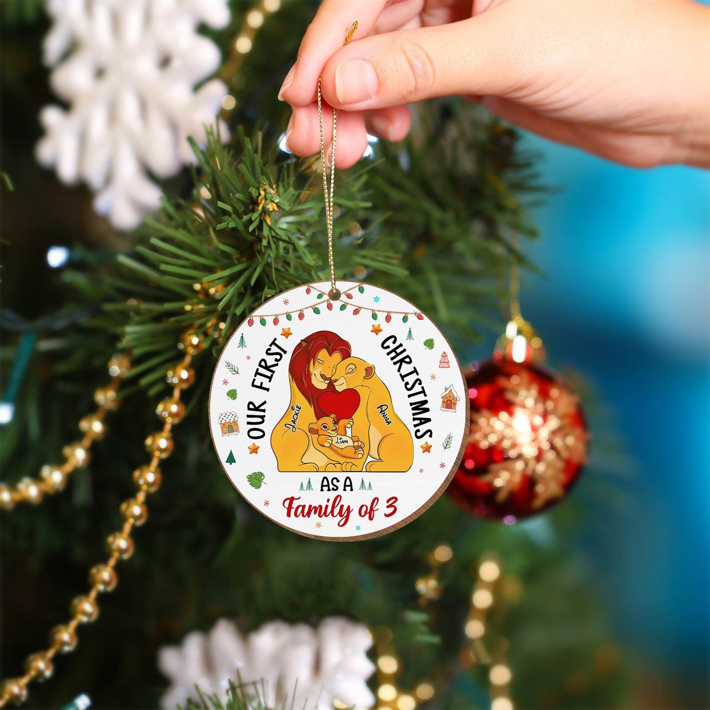 365Gifty personalized first Christmas ornament featuring Lion King family design hanging on a Christmas tree