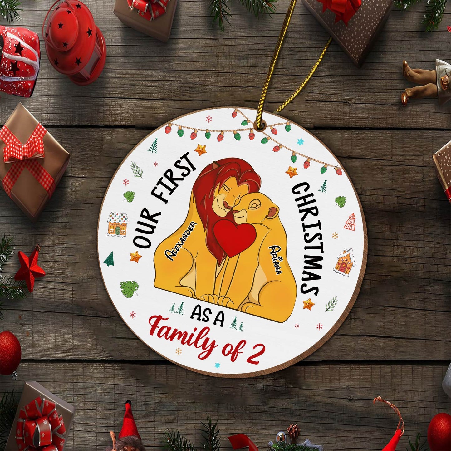 365Gifty personalized first Christmas ornament featuring two lions with names Alexander and Ariana on holiday decor background