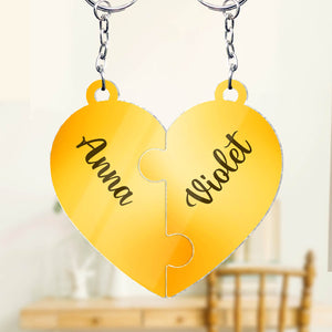 Personalized friendship keychain featuring a heart design with the names Anna and Violet engraved