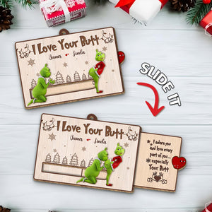 Personalized Grinch Christmas card featuring the Grinch with a fun sliding design and custom names