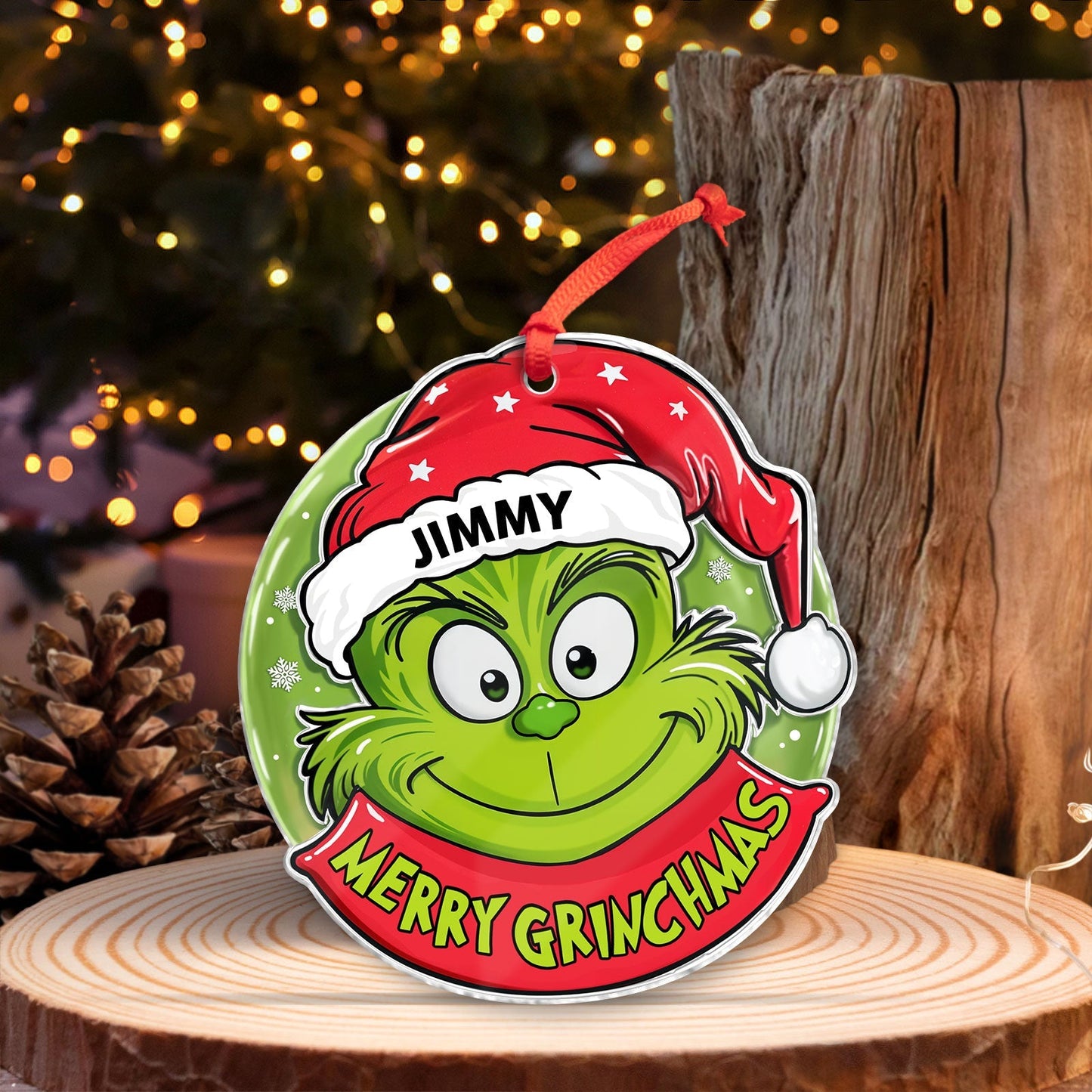 Personalized Grinch Christmas ornament with green Grinch face wearing red Santa hat labeled Jimmy