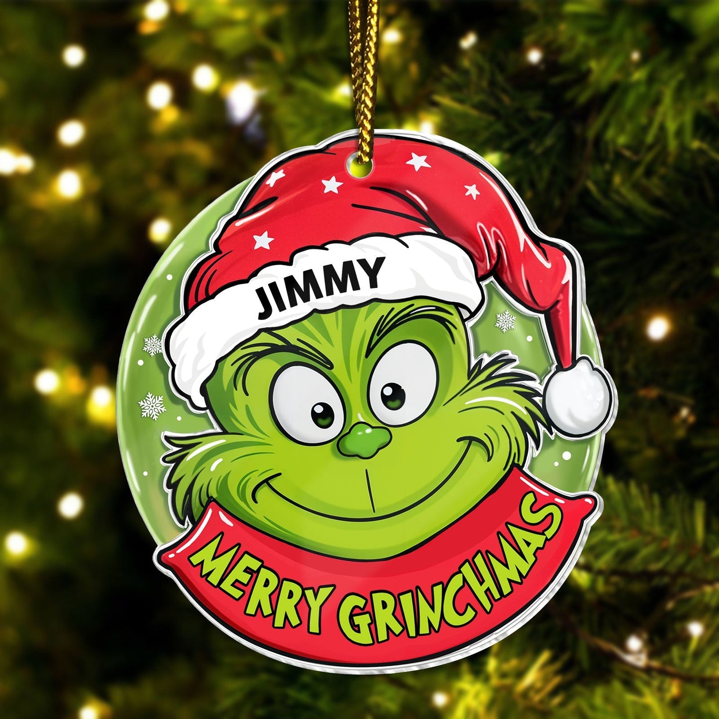Personalized Grinch Christmas ornament with red Santa hat and Merry Grinchmas text hanging on tree