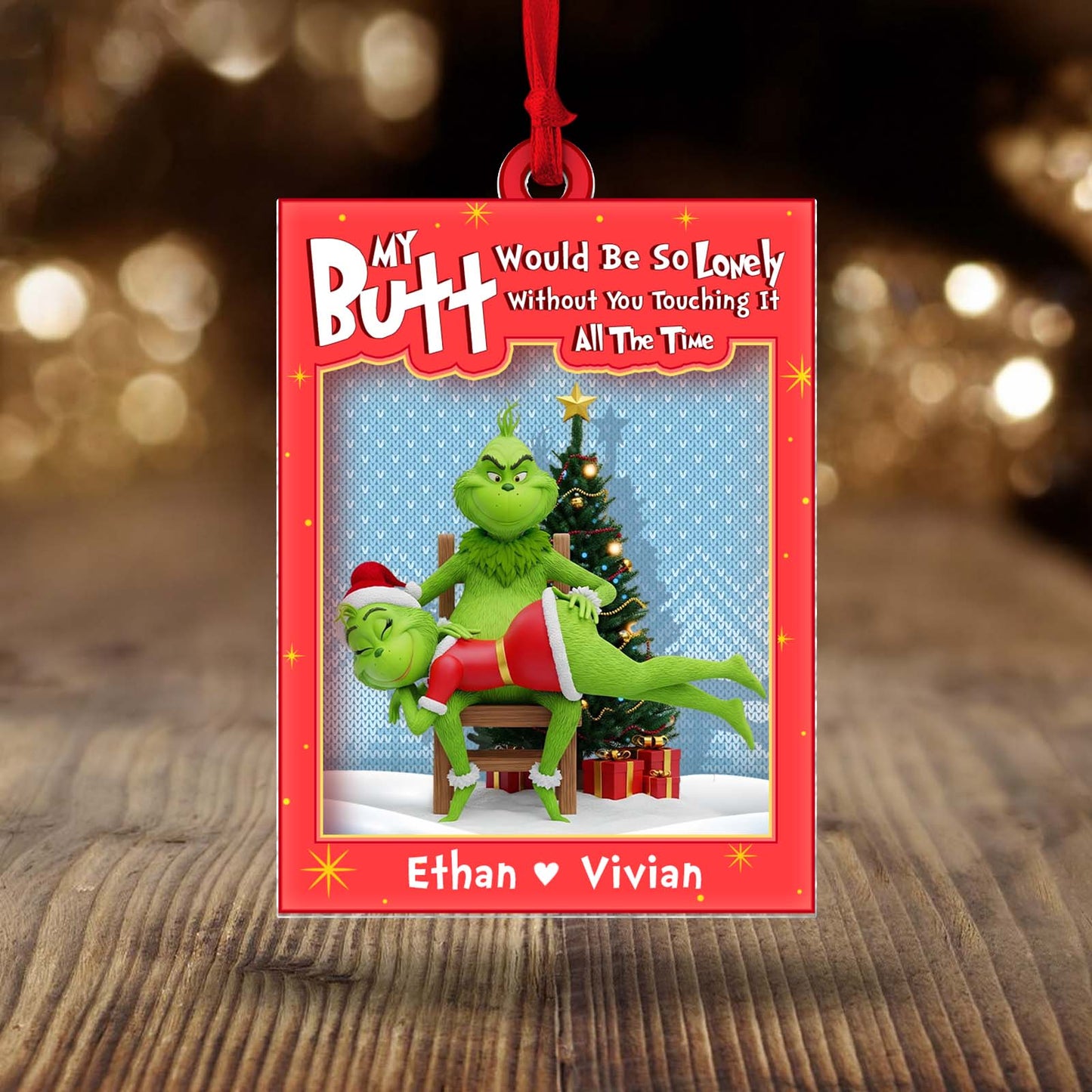 Personalized Grinch couple ornament featuring Ethan and Vivian by a Christmas tree