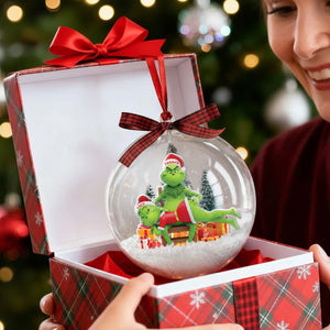 Personalized Grinch couple ornament in a festive box, depicting the Grinch and partner in holiday decor