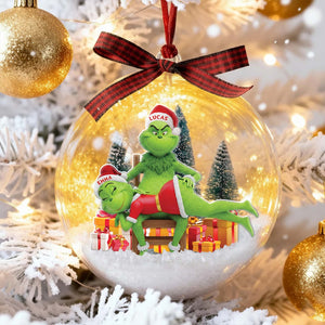 Personalized Grinch couple ornament with festive design featuring names Lucas and Emma on a holiday scene