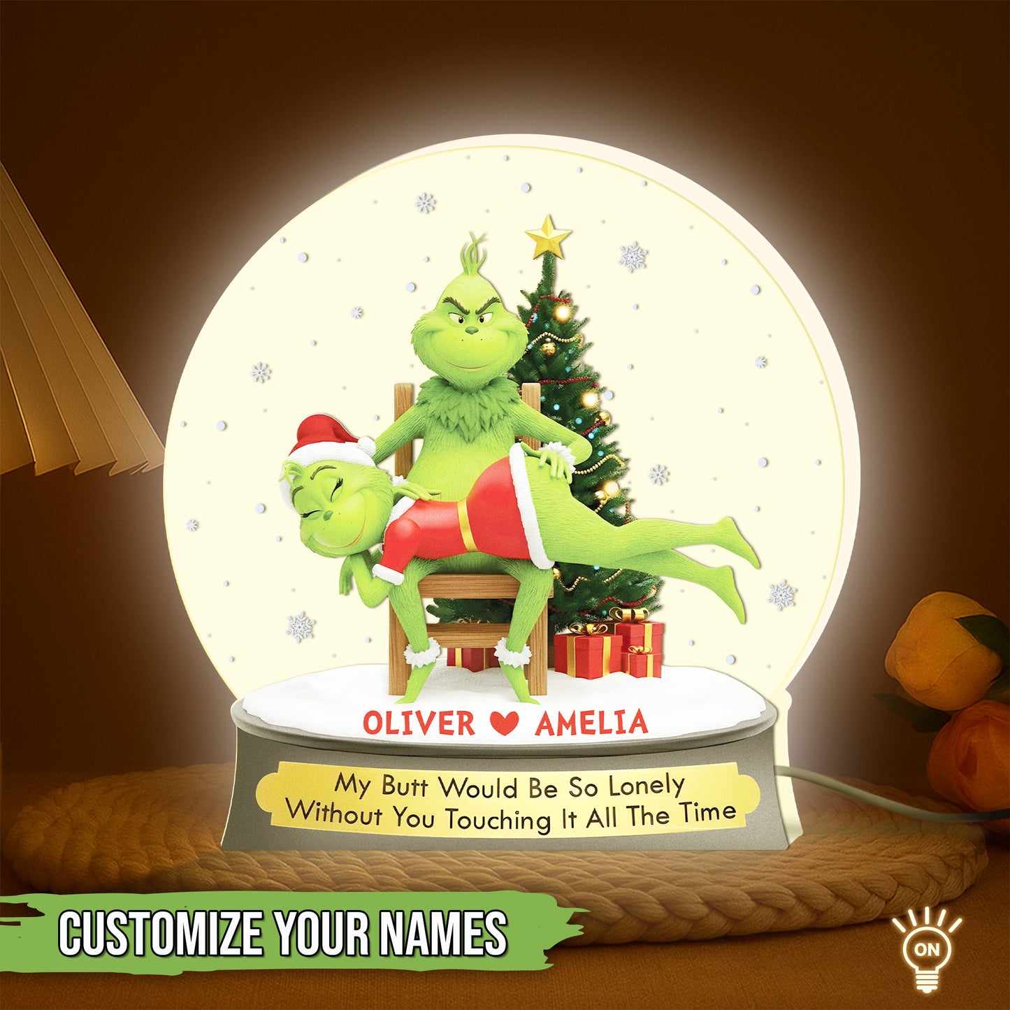 Personalized Grinch light box featuring a festive design with customizable names and a playful quote