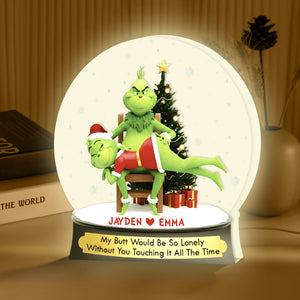 Personalized Grinch light box featuring custom names and a charming holiday scene