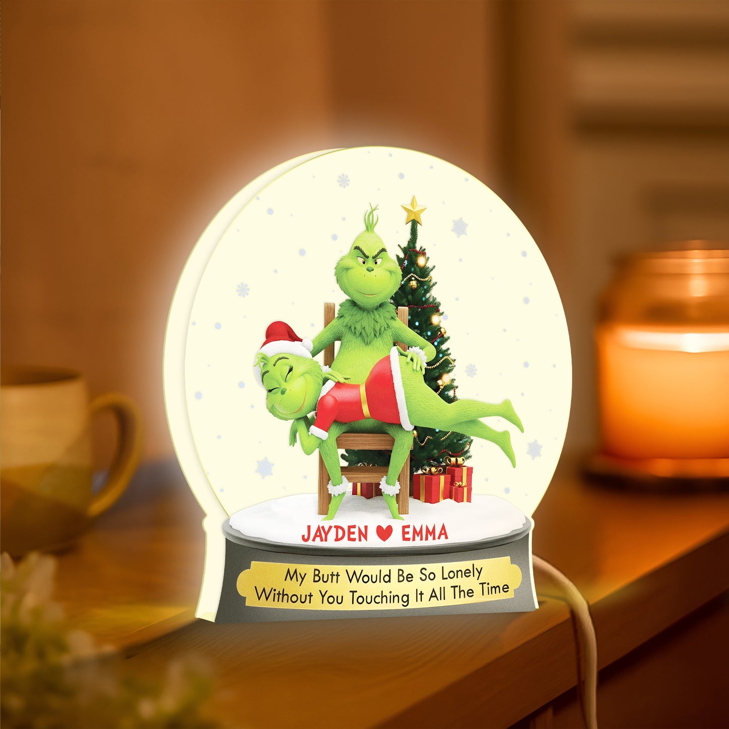 Personalized Grinch light box featuring festive Grinch character with custom names for holiday decor