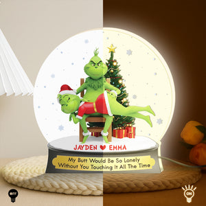 Personalized Grinch light box featuring festive design with customizable names for holiday cheer