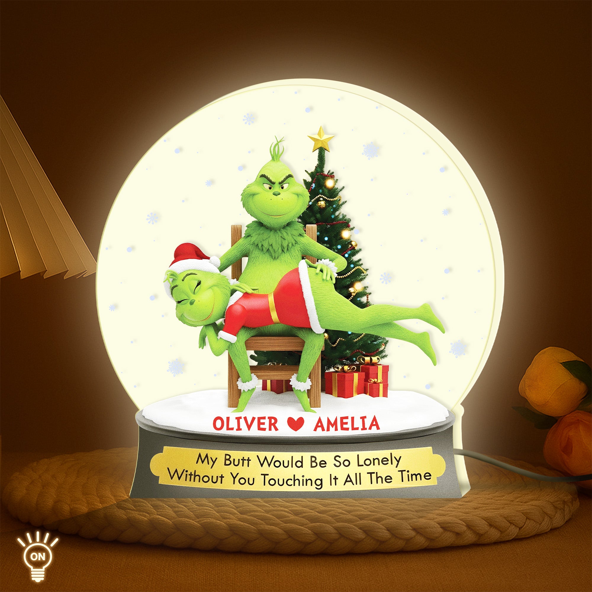 Personalized Grinch light box featuring customizable names with a festive design