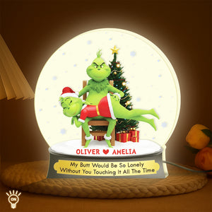 Personalized Grinch light box featuring customizable names with a festive design