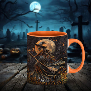 Personalized Halloween mug with witch design and name Sarah in orange and black colors