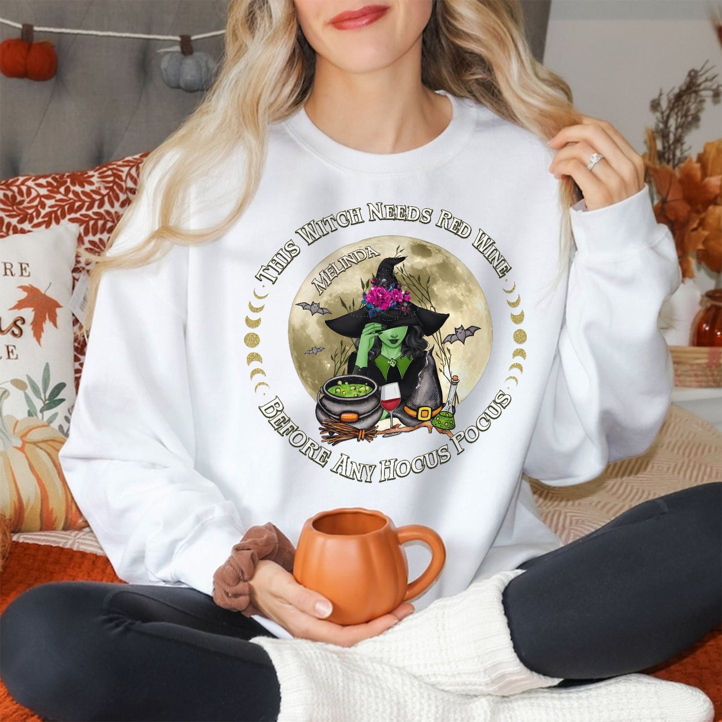 White personalized Halloween sweatshirt with witch graphic and text this witch needs red wine