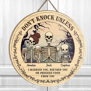 Personalized Halloween wooden door sign featuring skeletons and humorous text for festive decoration