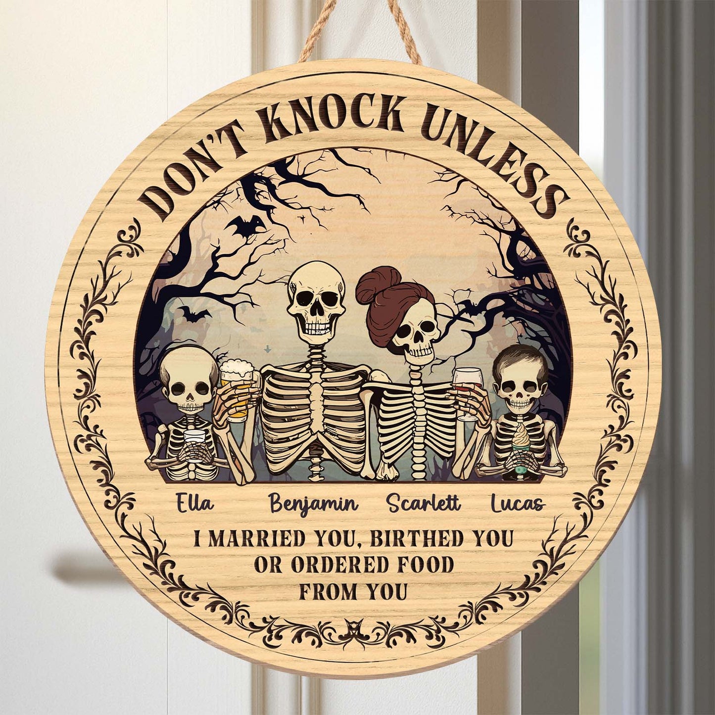 Personalized Halloween wooden door sign featuring skeletons and spooky text for festive decor