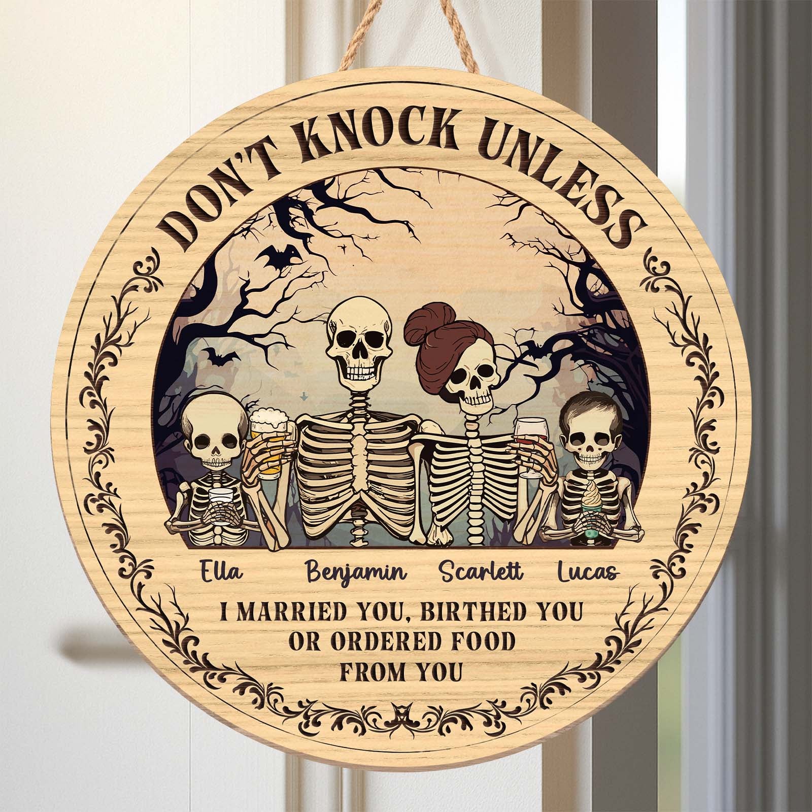 Personalized Halloween wooden door sign featuring skeletons and spooky text for festive decor