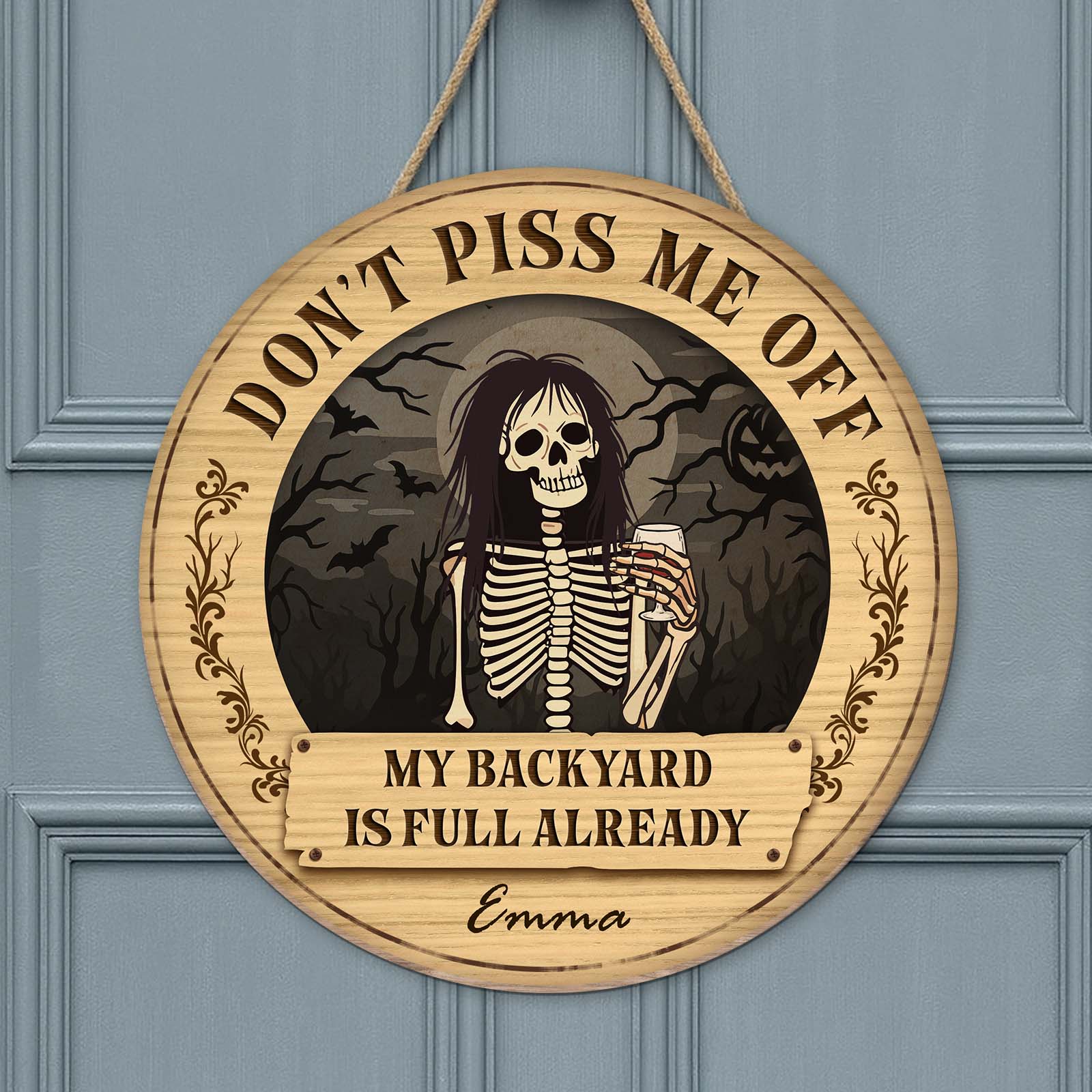 Personalized Halloween wooden door sign featuring a skeleton with spooky background and custom name
